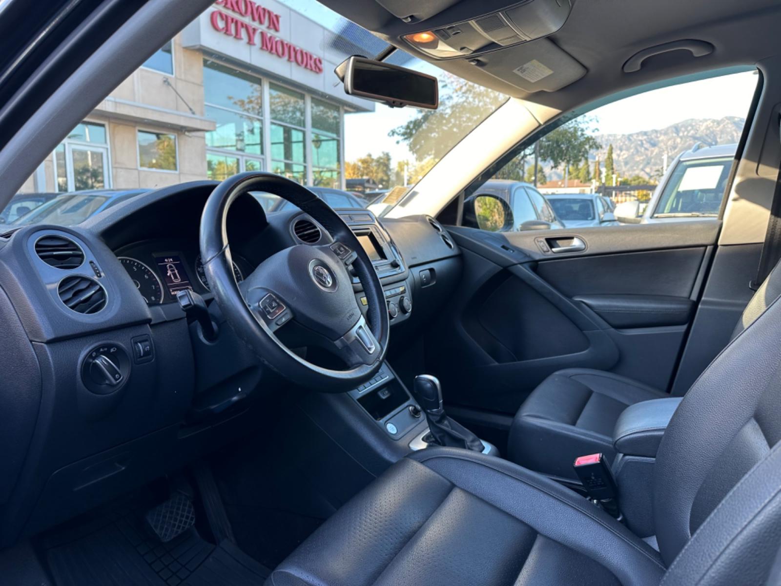 2016 Black /Black Volkswagen Tiguan (WVGAV7AX5GW) , AUTOMATIC transmission, located at 30 S. Berkeley Avenue, Pasadena, CA, 91107, (626) 248-7567, 34.145447, -118.109398 - Crown City Motors is a used “Buy Here Pay Here” car dealer in Pasadena CA. “Buy Here Pay Here” financing, means that when you purchase your vehicle from our dealership, that you make the payments to the dealership as well. We do not need the banks approval to get you approved for a used auto - Photo #9